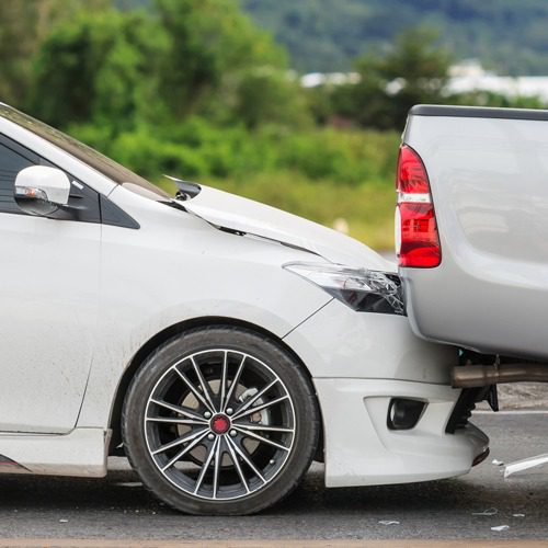 Rear end collision with a car and a truck.